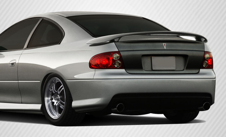 Unleash Style: 2004 - 2006 Pontiac GTO Carbon Creations OEM Look 1 - Piece Trunk