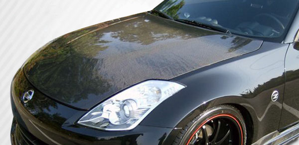 Unleash Style: 2007 - 2008 Nissan 350Z Z33 Carbon Creations Dritech OEM Look One - Piece Hood
