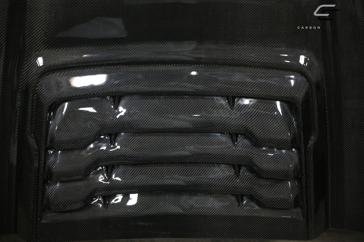 Upgrade Your 1999 - 2007 Ford Super Duty or 2000 - 2005 Ford Excursion with Carbon Creations' Stunning Raptor Look Hood!