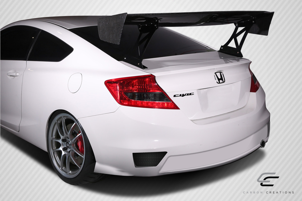 Get Your Universal 62 Carbon Creations DriTech VRX V1 Short Wing 9 - Piece Complete Kit Now!