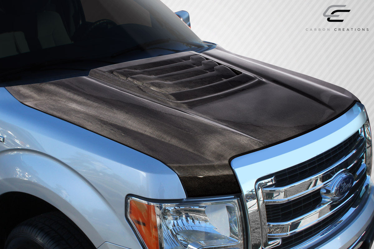 Upgrade Your 2009 - 2014 Ford F - 150 with Carbon Creations Raptor Look Hood!
