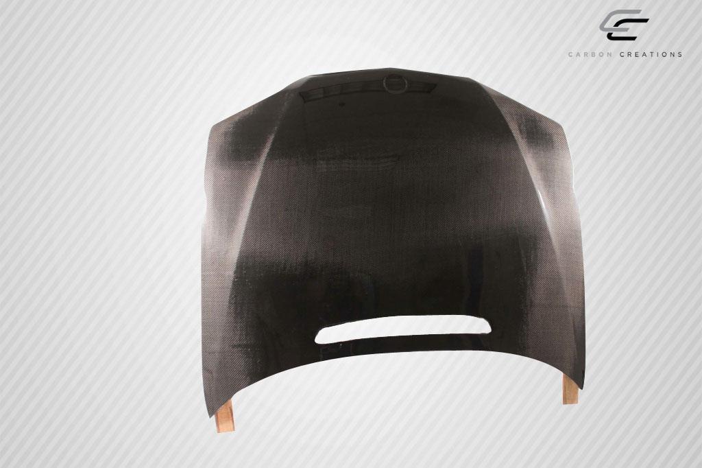 Unleash Style: 2002 - 2005 BMW 3 Series E46 4DR Carbon Creations OEM Look 1 - Piece Hood