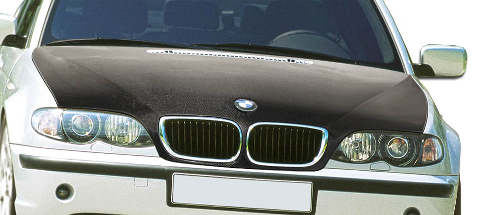 Unleash Style: 2002 - 2005 BMW 3 Series E46 4DR Carbon Creations OEM Look 1 - Piece Hood