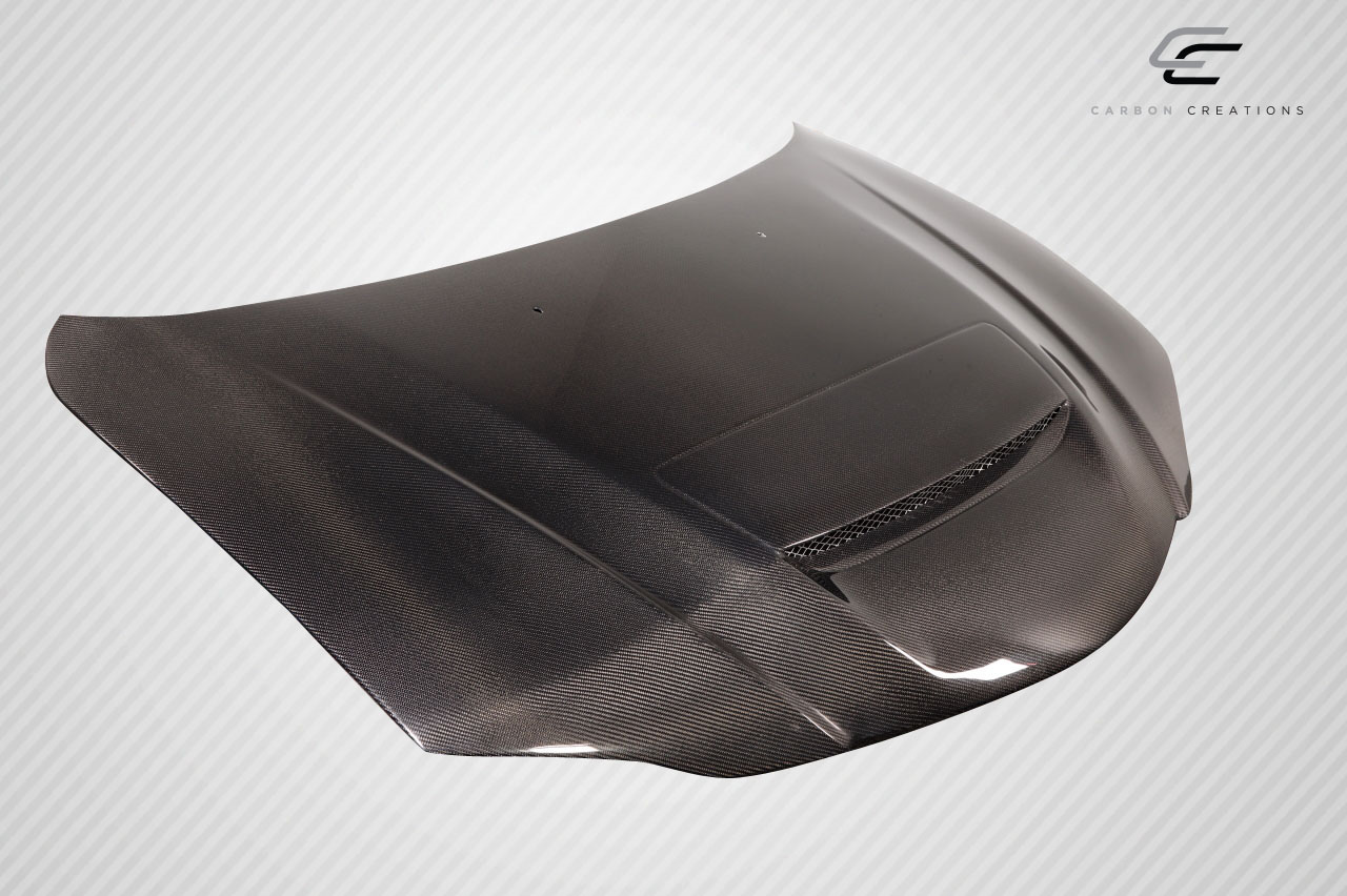 Revamp Your 2004 - 2008 Mazda 3 4DR with Carbon Creations M - Speed One - Piece Hood!