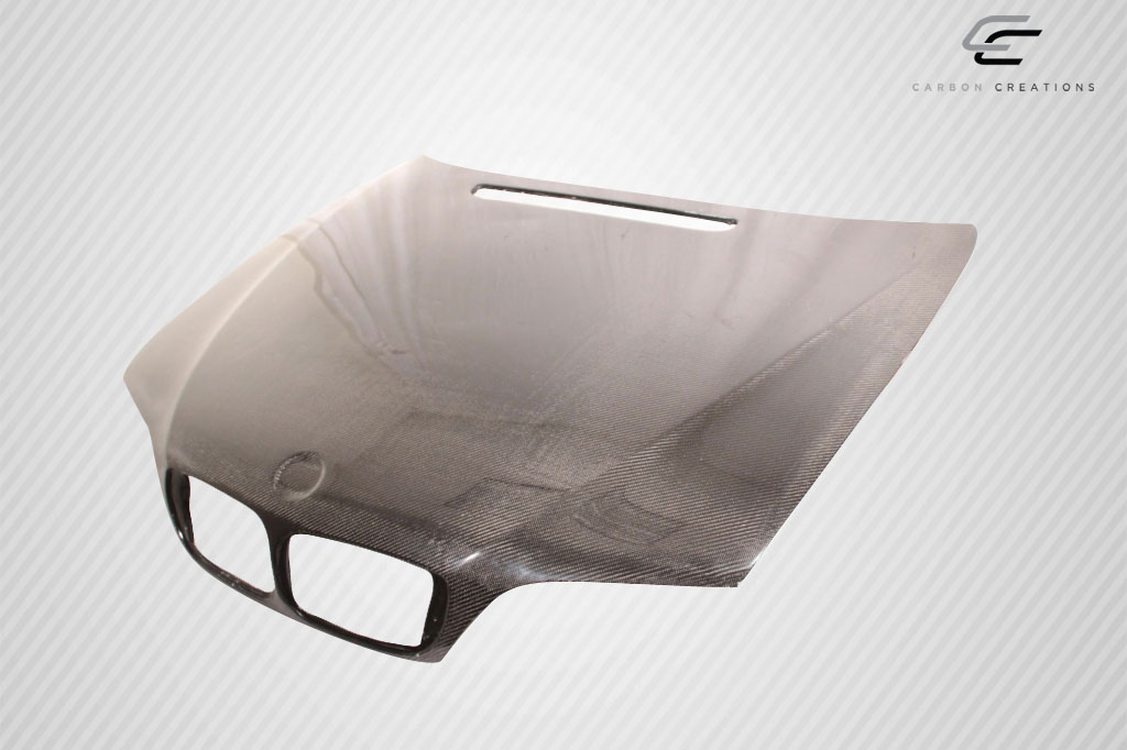 Unleash Style: 2002 - 2005 BMW 3 Series E46 4DR Carbon Creations OEM Look 1 - Piece Hood