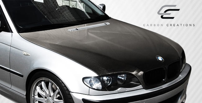 Unleash Style: 2002 - 2005 BMW 3 Series E46 4DR Carbon Creations OEM Look 1 - Piece Hood