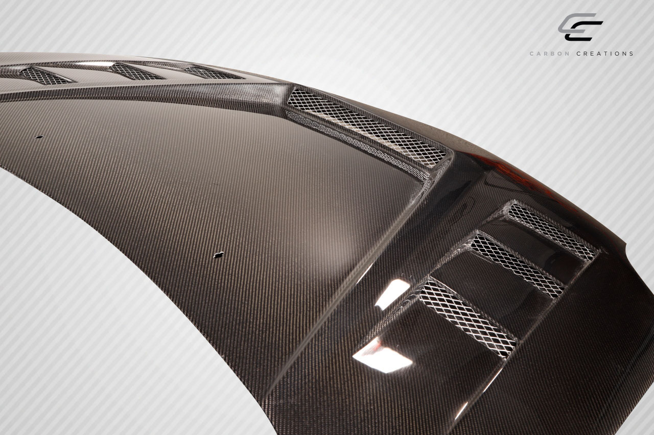 Unleash Style: 2006 - 2012 Mitsubishi Eclipse Carbon Creations Magneto 1 - Piece Hood