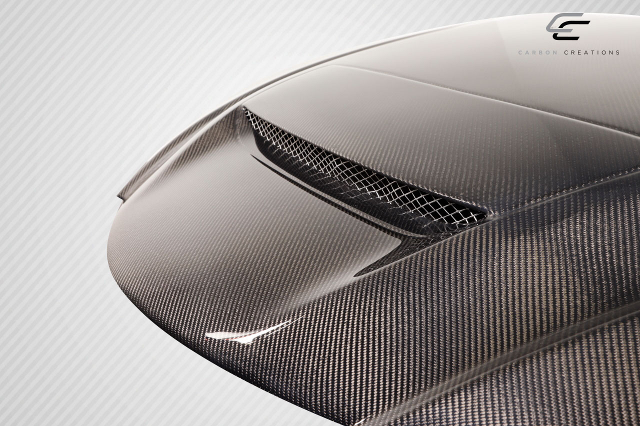 Revamp Your 2004 - 2008 Mazda 3 4DR with Carbon Creations M - Speed One - Piece Hood!
