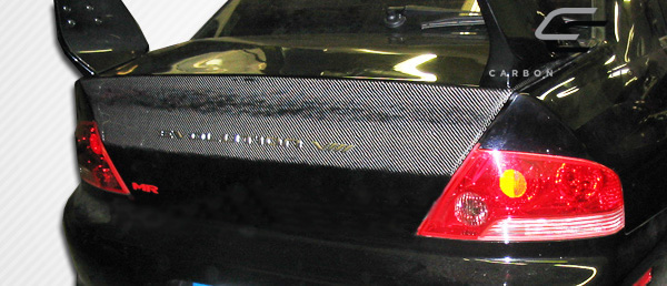 Transform Your 2002 - 2006 Mitsubishi Lancer with Carbon Creations OEM Look Carbon Fiber Trunk!