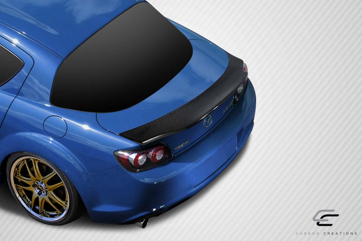 Revamp Your 2004 - 2011 Mazda RX - 8 with Carbon Creations DriTech Darkforce One - Piece Wing Spoiler