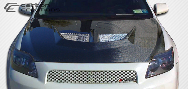 Unleash Style: 2005 - 2010 Scion tC Carbon Creations Evo One - Piece Hood