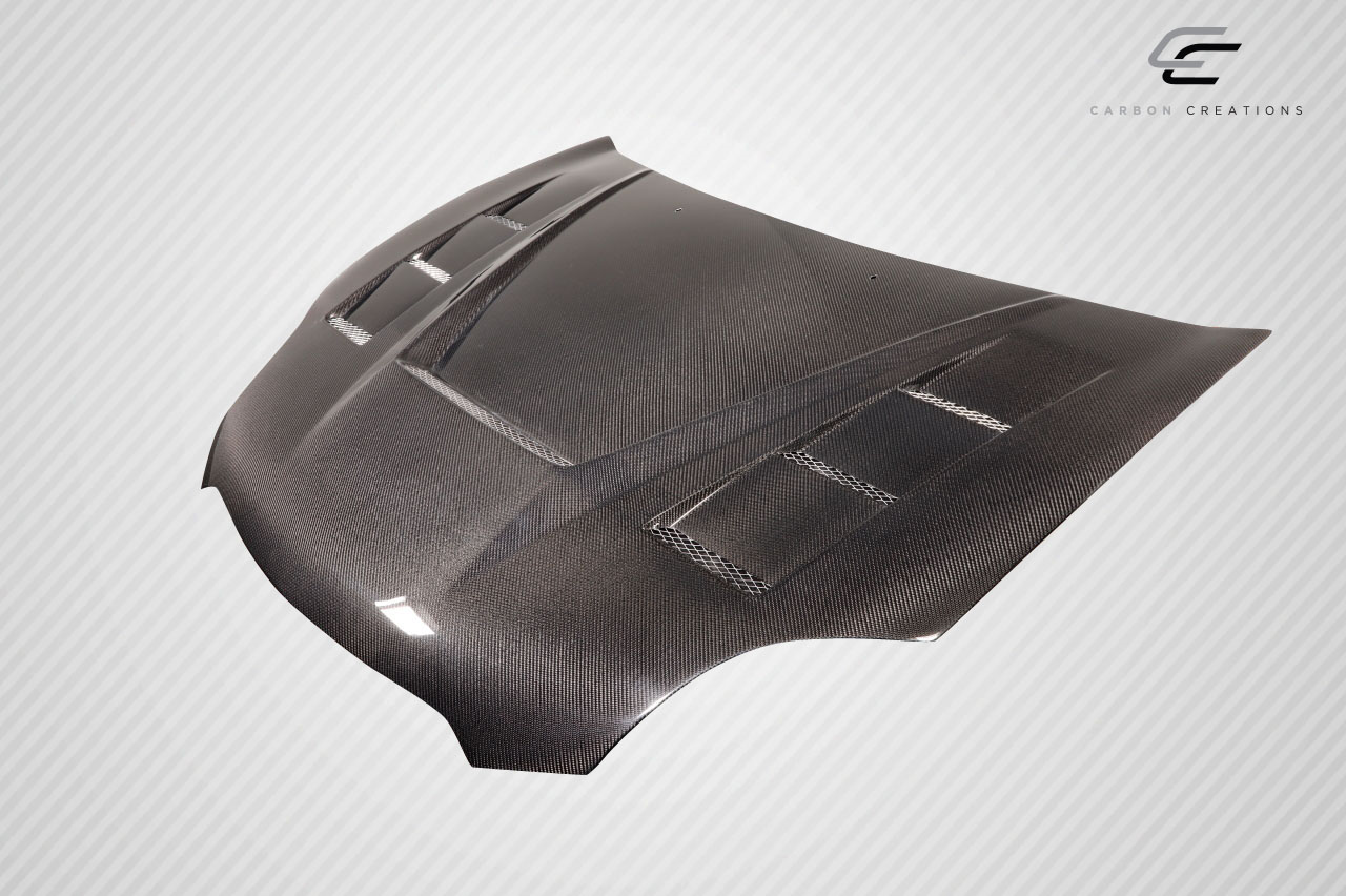 Unleash Style: 2006 - 2012 Mitsubishi Eclipse Carbon Creations Magneto 1 - Piece Hood