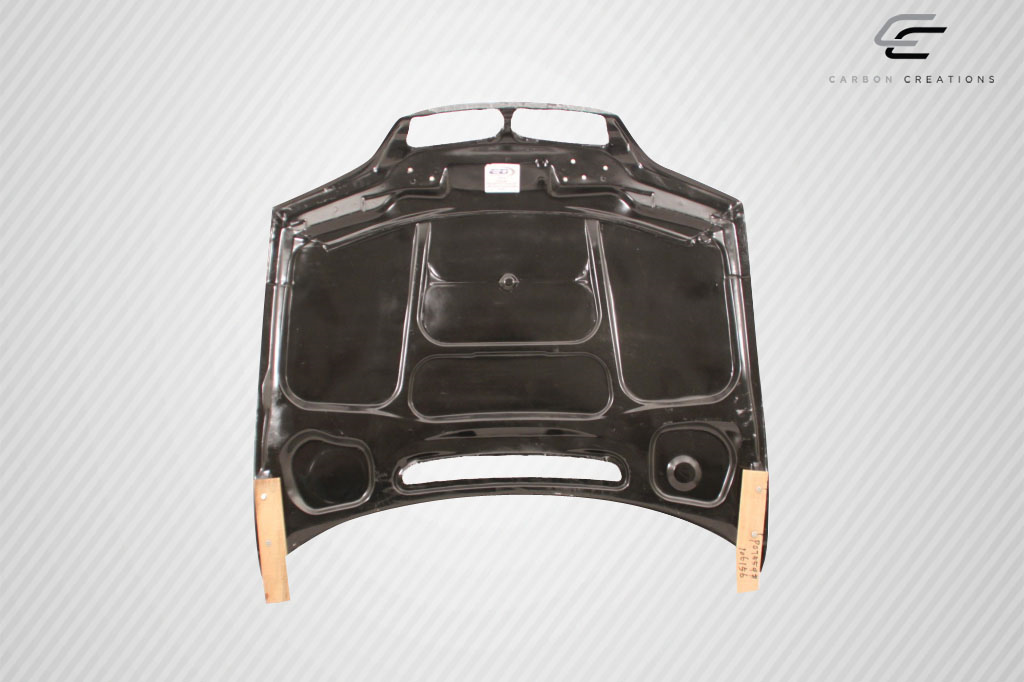 Unleash Style: 2002 - 2005 BMW 3 Series E46 4DR Carbon Creations OEM Look 1 - Piece Hood
