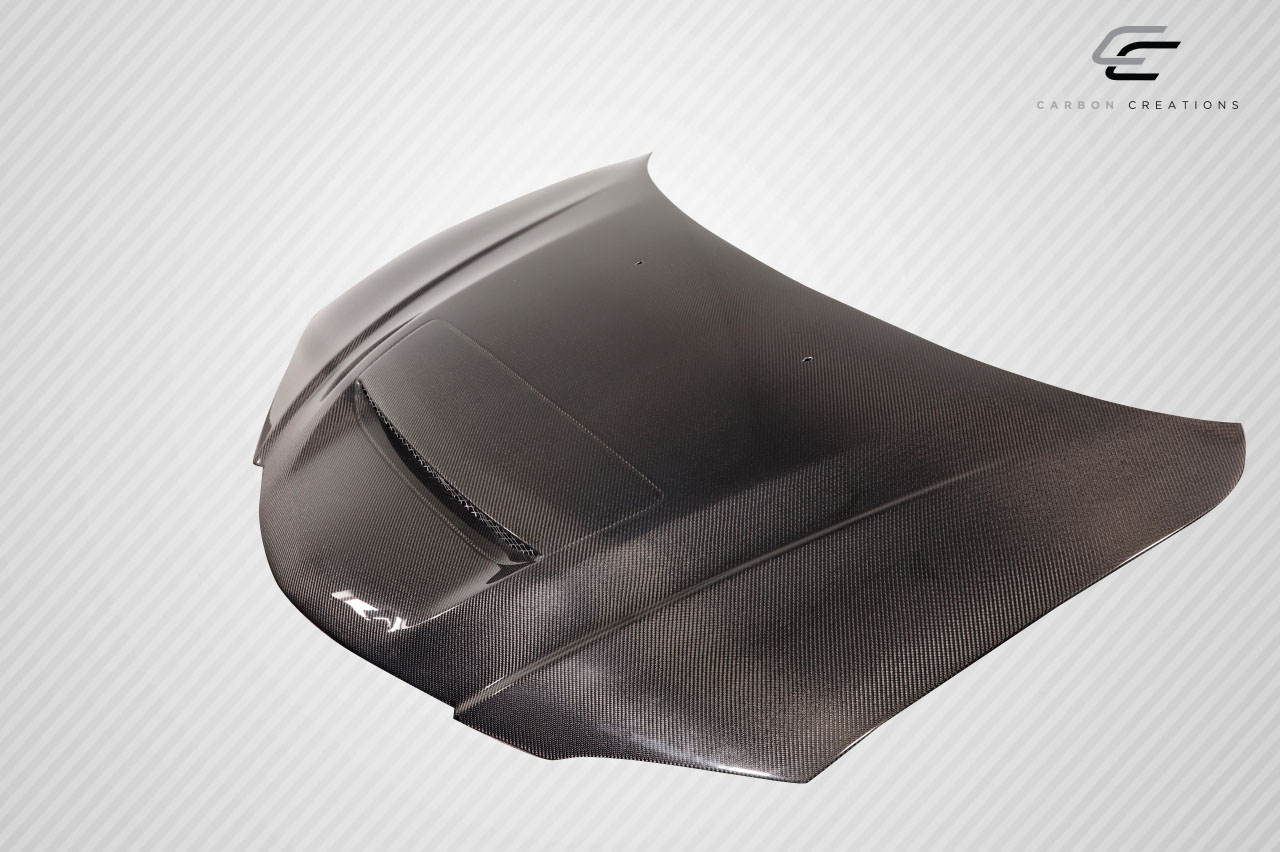 Revamp Your 2004 - 2008 Mazda 3 4DR with Carbon Creations M - Speed One - Piece Hood!