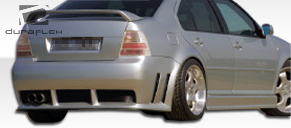 Upgrade Your 1999 - 2004 Volkswagen Jetta with Duraflex Piranha Rear Bumper Cover - Single Piece!